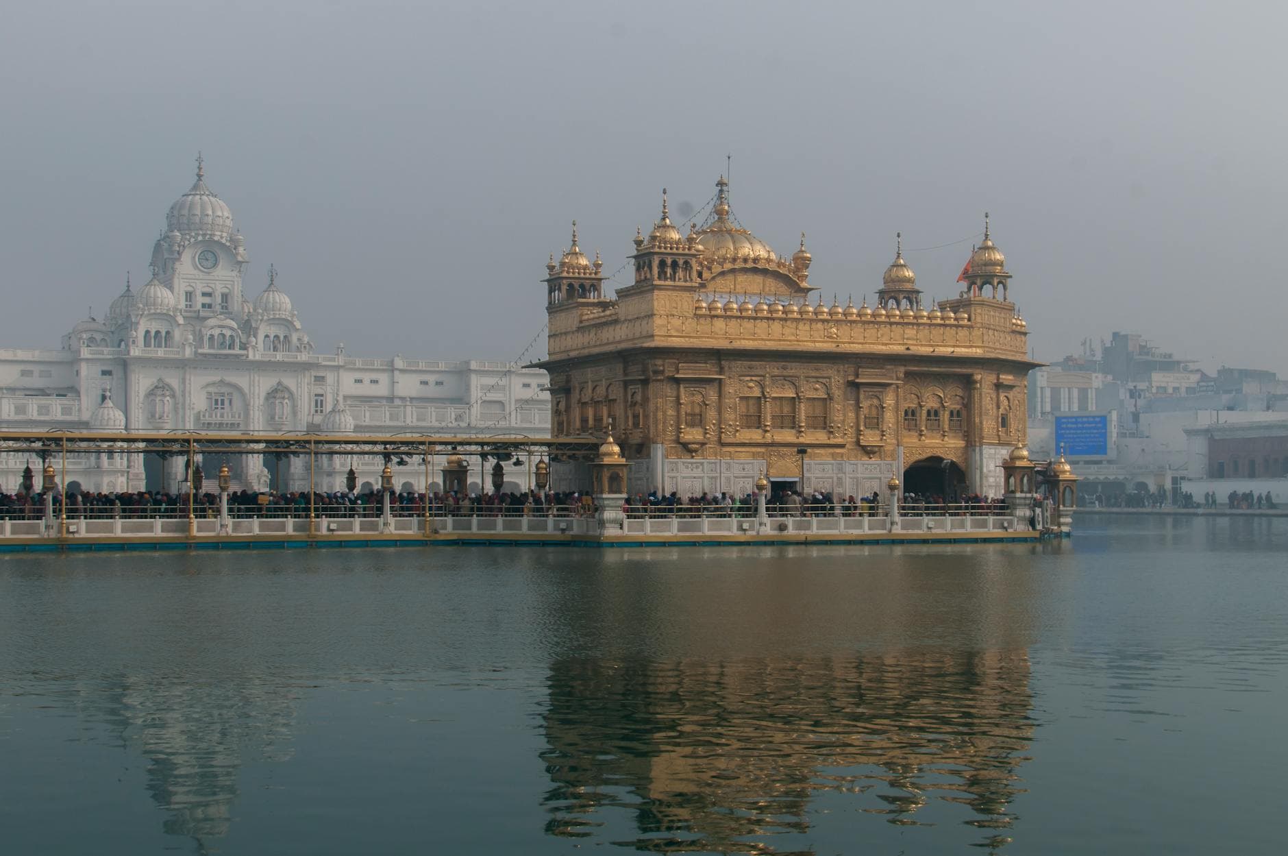 The iconic Golden Temple reflecting in the water at Amritsar, India.